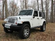 2013 Jeep Wrangler Jeep Wrangler Unlimited Sahara Sport Utility 4-Doo