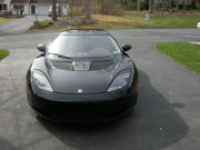 2010 Lotus Evora with red interior. 